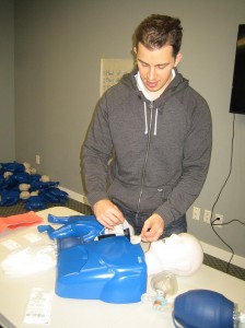 Applying AED pads during CPR